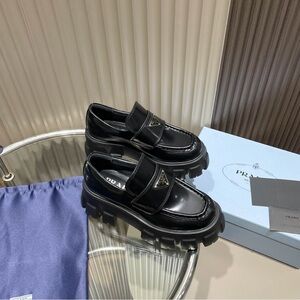 Prada Women's Black Glossy Loafers